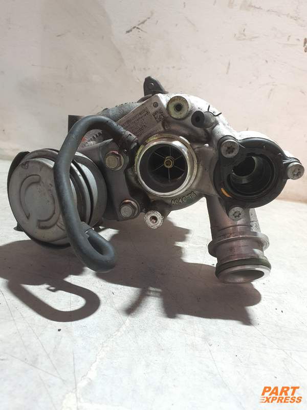 Turbocharger 1,4l TFSI 92kW 89tkm Audi A1 A3 VW Golf Passat 03C100092J CAXA